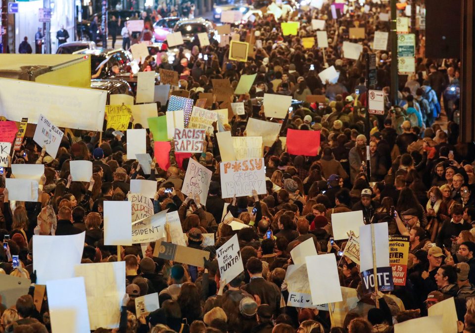  CHICAGO... protesters walk during a protest Donald Trump in Chicago, Illinois, on Wednesday