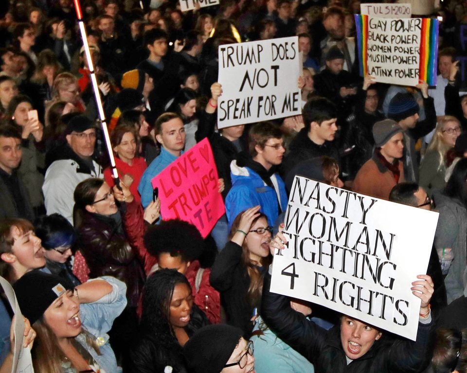  Up in arms... Protesters are up in arms over the billionaire's rhetoric against immigrants