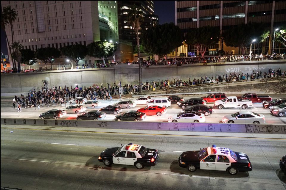  Protesters in LA walked into the road and blocked traffic as millions despaired at the news of a Trump presidency