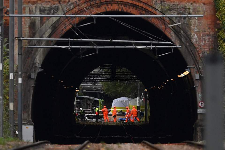  Emergency workers continued to work at the scene of the derailed tram