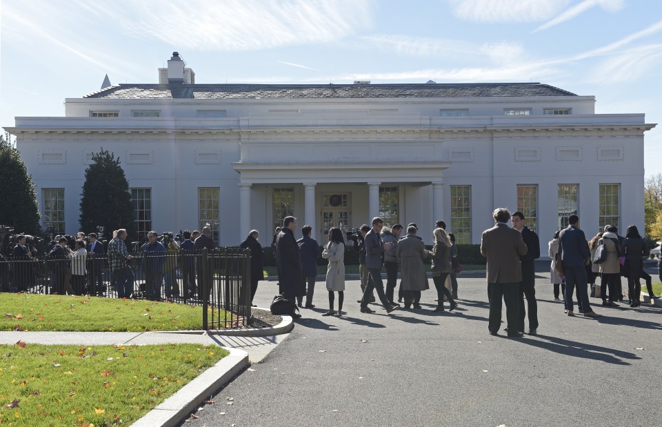  Staffers gather outside the West Wing awaiting President-elect Trump's arrival