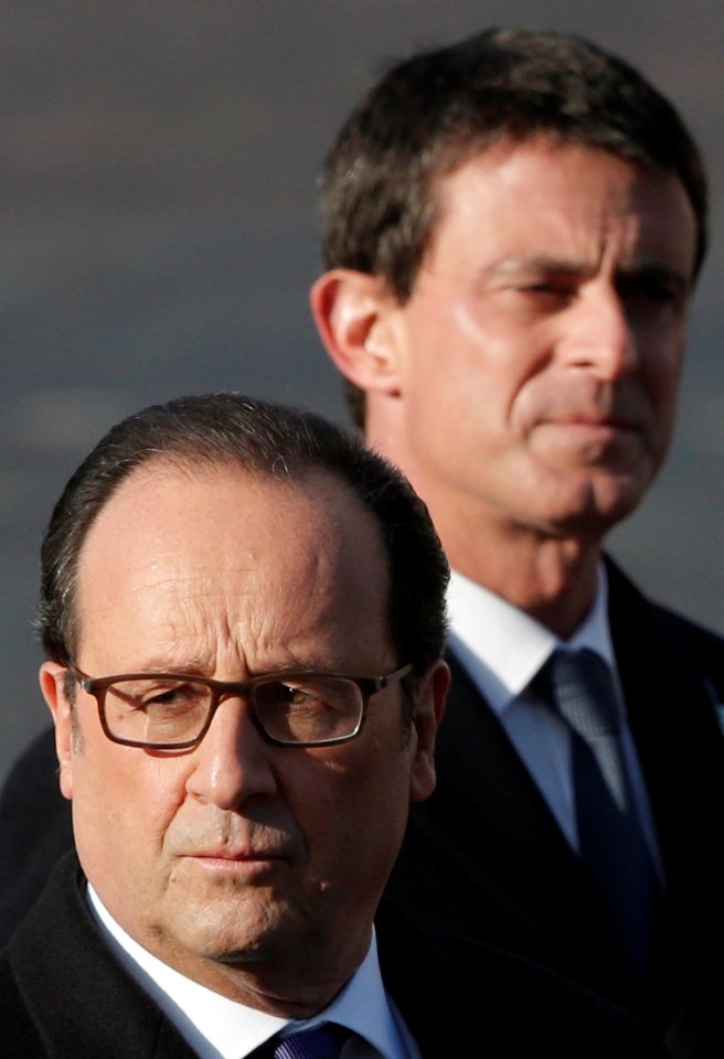  France's President Francois Hollande and Prime Minister Manuel Valls attend a commemoration ceremony for Armistice day in Paris