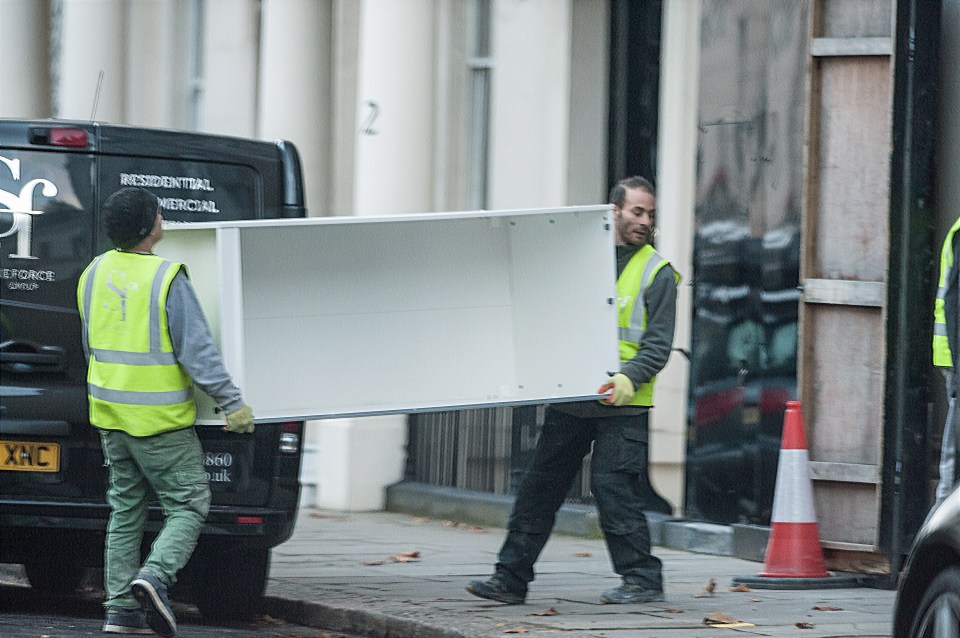  Builders at a property associated with Lady Tina Green, in London