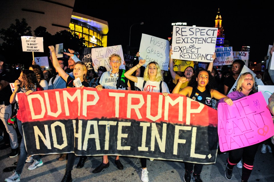  Demonstrators in Miami, Florida, last night protesting against the election of Donald Trump as President of the United States