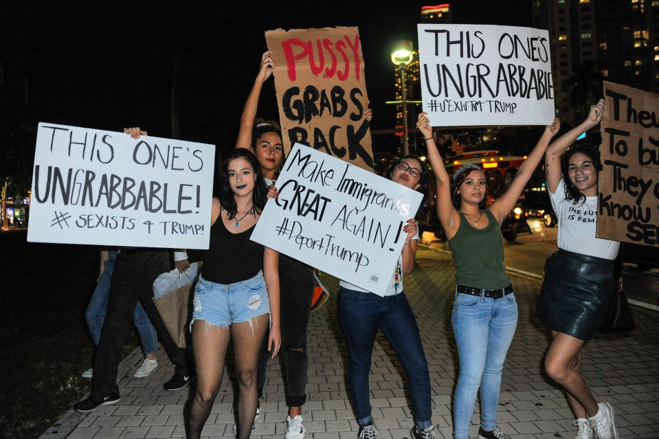  Angry citizens in Miami, Florida, last night held up placards condemning comments made by Trump about women