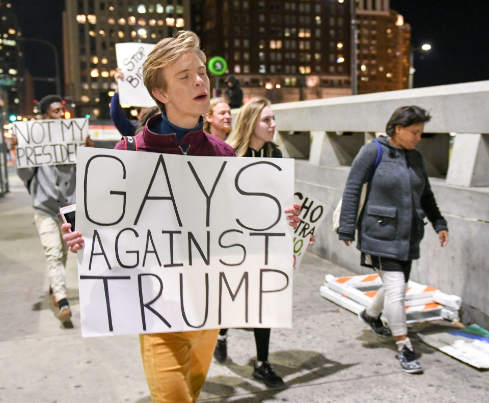  An anti-Trump protestor in Philadelphia, Pennsylvania, last night who believes the President-elect is a threat to gay people