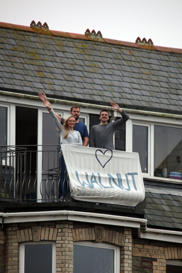  Well-wishers were pictured overlooking the beach