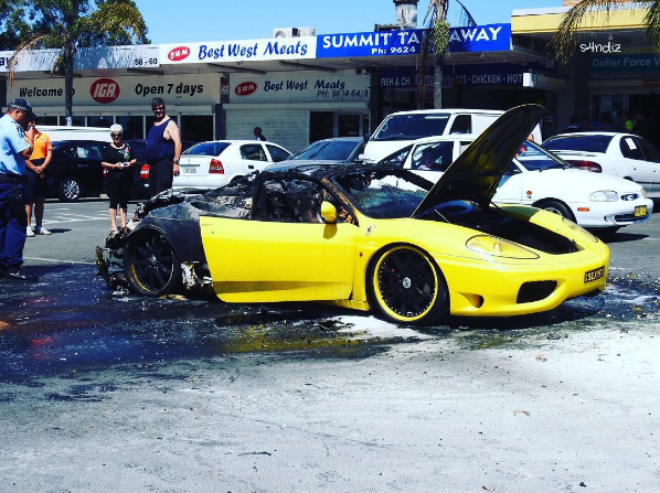  A driver stopped at a shopping centre in Sydney - only for his Ferrari to catch fire