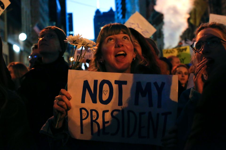  Demonstrators protest against US President-elect Donald Trump in front of Trump Tower