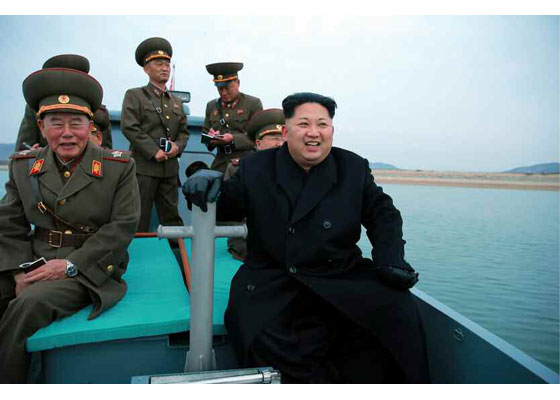  Kim on a boat trip with his military leaders during the visit