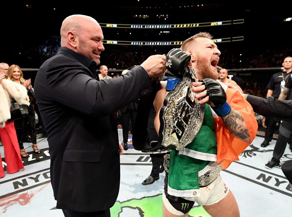  Conor McGregor is presented his second belt by Dana White