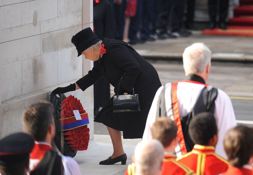 The Queen lays the first wreath during the annual Remembrance Sunday Service