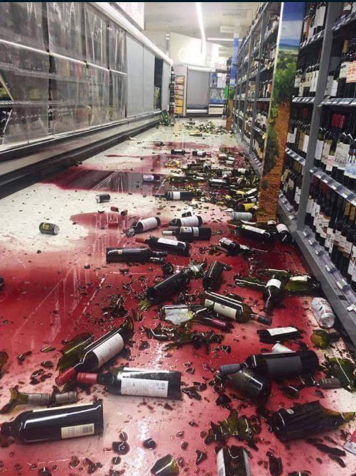  Bottles of wine smashed across a supermarket floor following the South Island quake