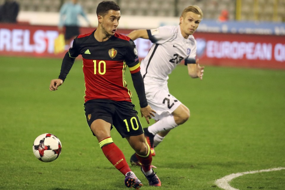  Hazard went off with a calf problem as Belgium thrashed Estonia 8-1