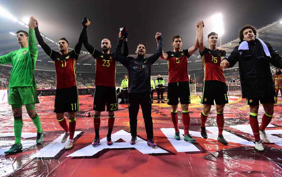  Belgium's players celebrate at full-time in front of their fans