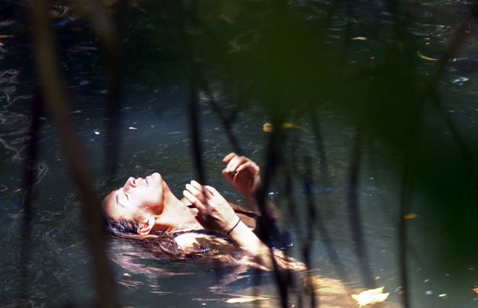  The star is pictured sunbathing after the storms in the jungle