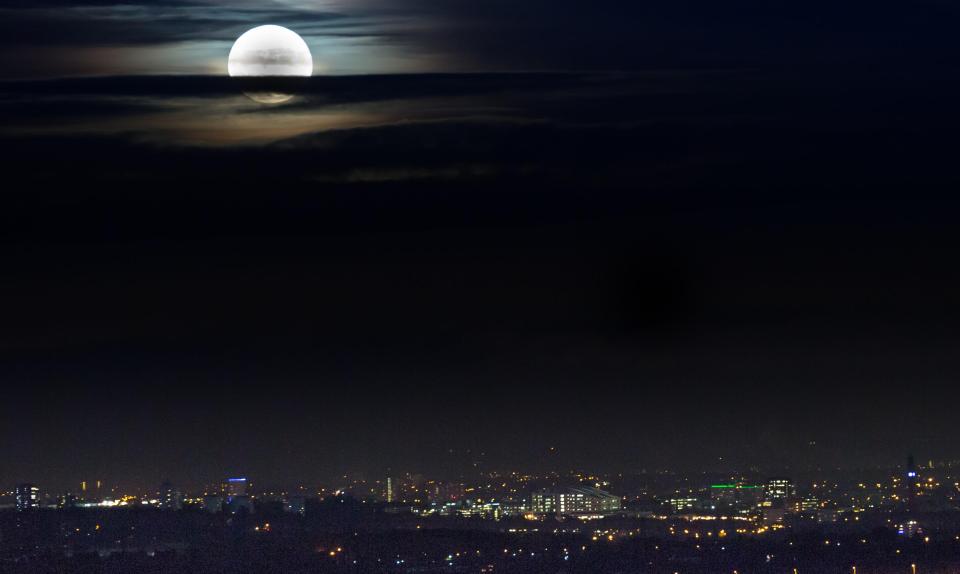  Clouds parted just enough to reveal a stunning sight of the rare supermoon over Birmingham tonight