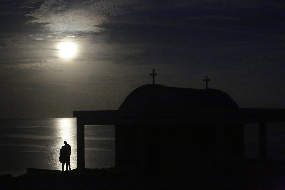  The supermoon rises over the Mediterranean sea in Cape Greco in eastern Cyprus