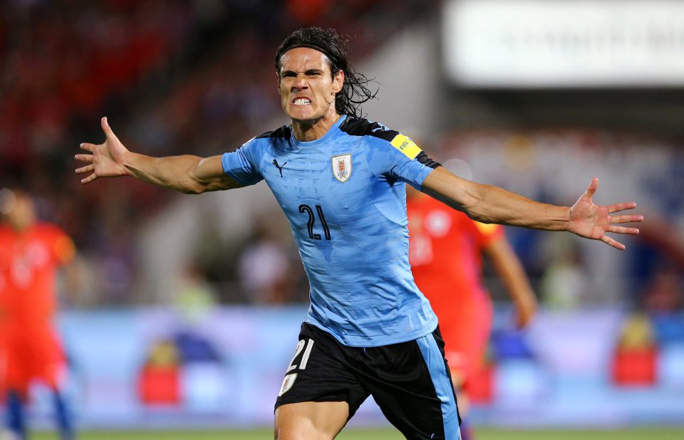  Edinson Cavani celebrates netting for Uruguay but they could not overturn Chile