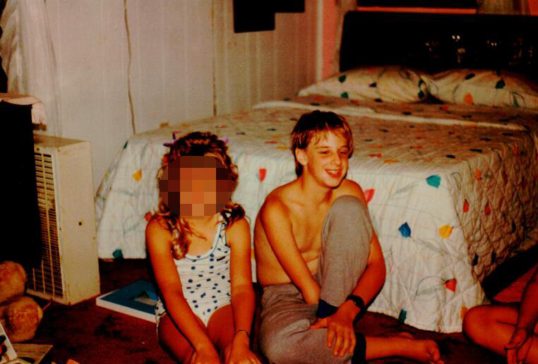  Todd, pictured right, at home during his childhood with a female friend