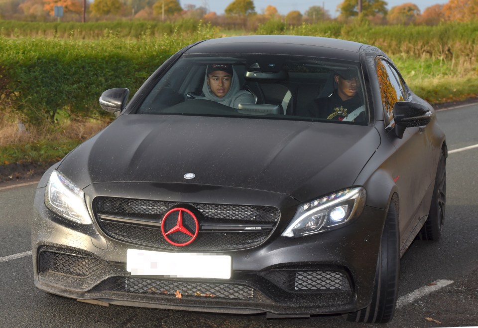  Jesse Lingard arrived for Manchester United training in his Mercedes with the customised red sign with team-mate Marcus Rashford yesterday