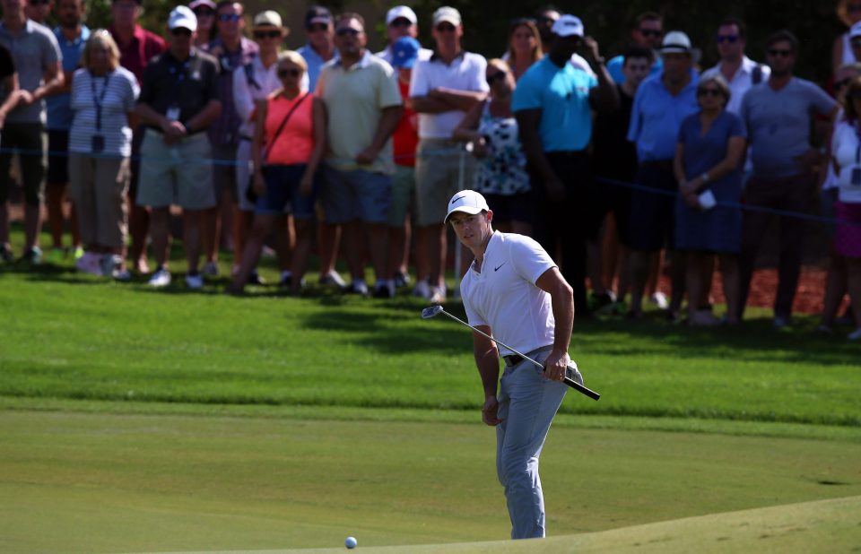 Rory McIlroy toils on day one of of the DP World Tour Championship 