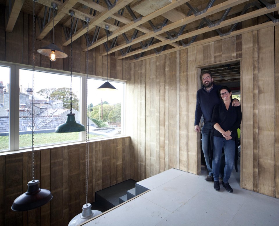 Rosie and Stuart Treasurer inside their newly done-up home