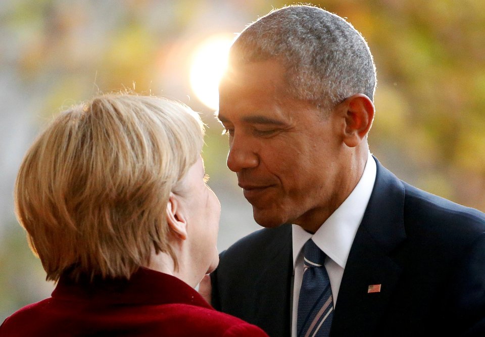  Obama is welcomed by German Chancellor Merkel upon his arrival at the chancellery in Berlin