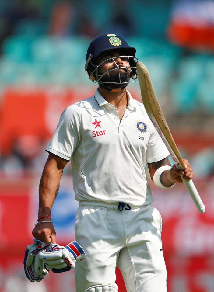  Virat Kohli looks to the heavens after his innings is finally ended by Ali