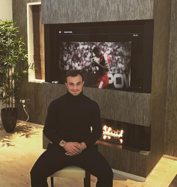  Stoke player Shaqiri appears to have a TV on in the background with footage of himself