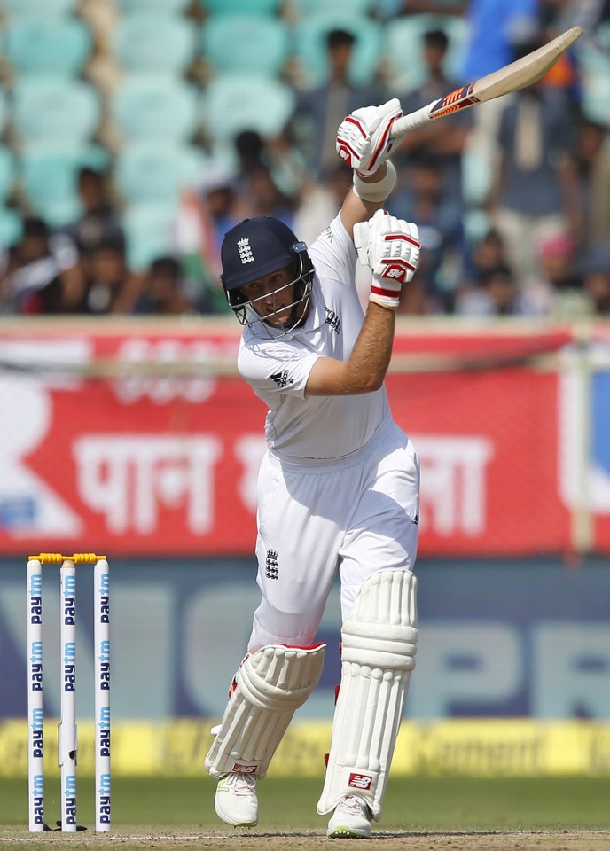  Joe Root plays a one-handed shot