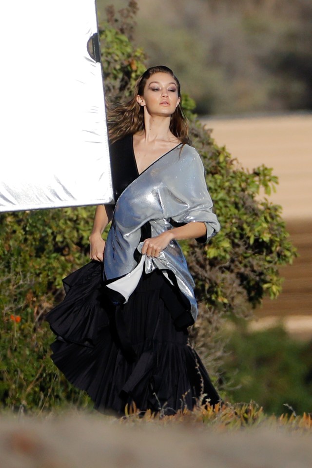 Another costume change saw Gigi wear a second black and silver dress