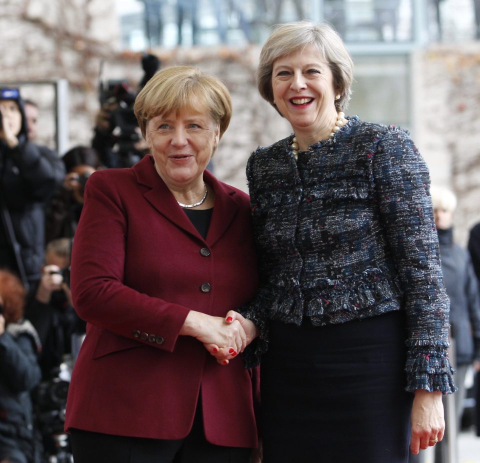  Theresa May put pressure on Merkel to cut deal on right for EU citizens in UK