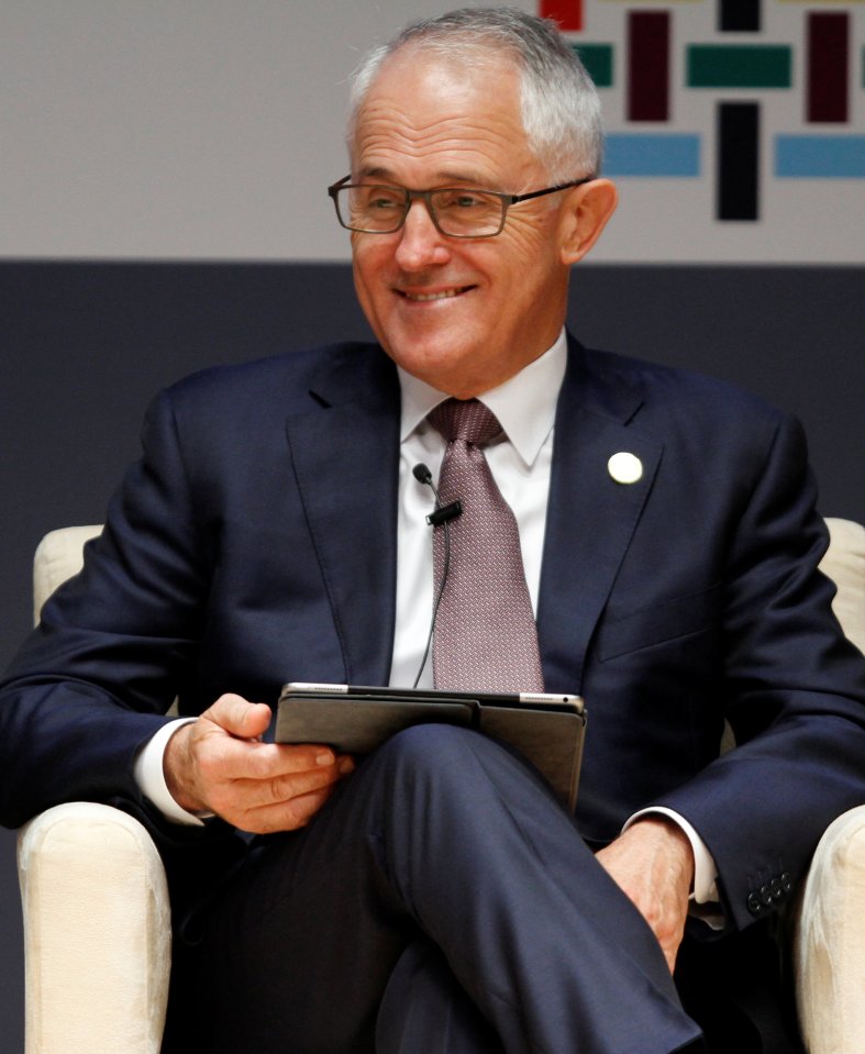 Australian Prime Minister Malcolm Turnbull smiles while attending a meeting at the 2016 APEC (Asian Pacific Economic Cooperation) CEO summit in Lima