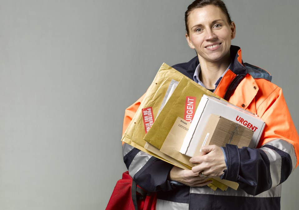 Courier/postwoman with copy space