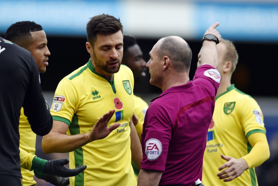  Norwich City's Martin Olsson is sent off by referee Scott Duncan