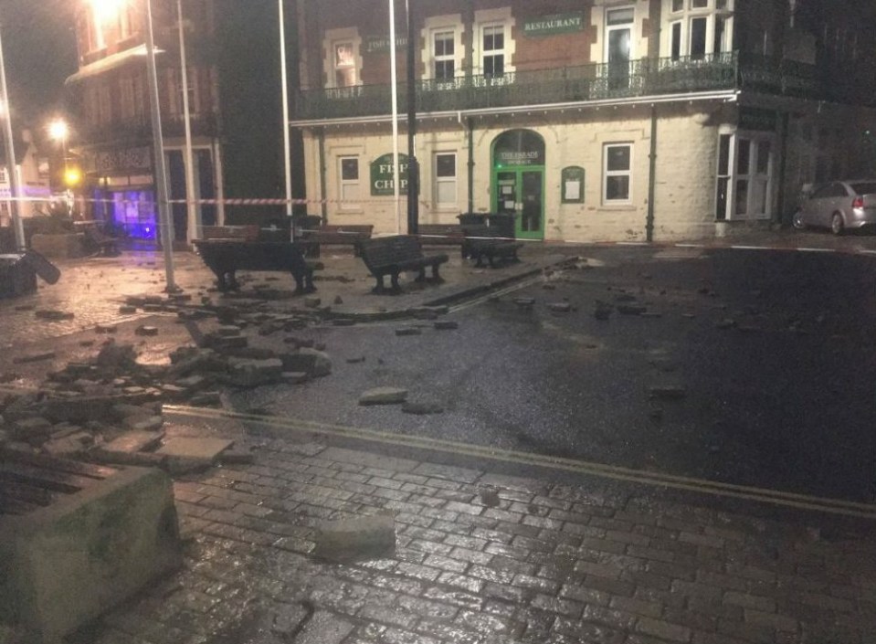  Bricks scattered across the seafront in Swanage early this morning