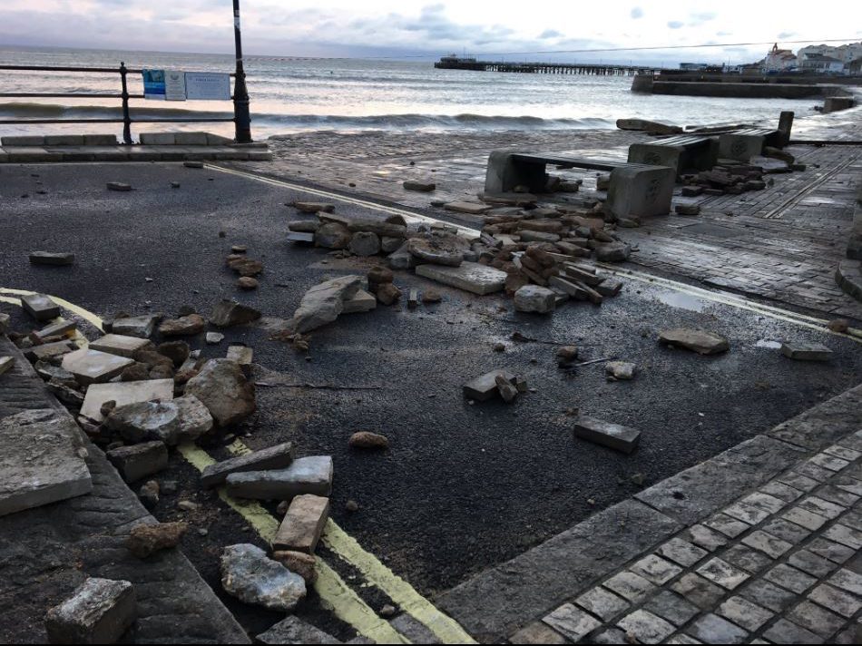  The wrecked sea wall in Swanage after braving last night’s waves