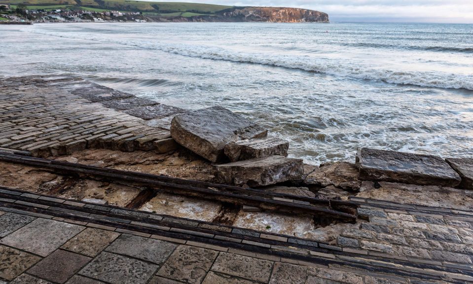  The damaged sea wall in Swanage, Dorset, following Storm Angus last night