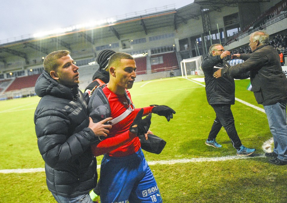  He and his son Jordan, above, were attacked by fans following the club's relegation