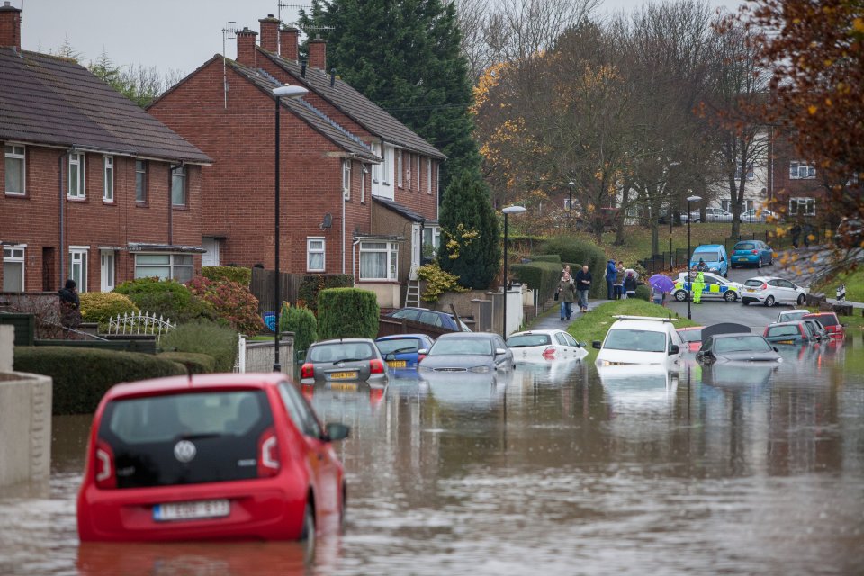  At least a dozens cars were submerged by flash flooding in Whitchurch Lane in Bristol today