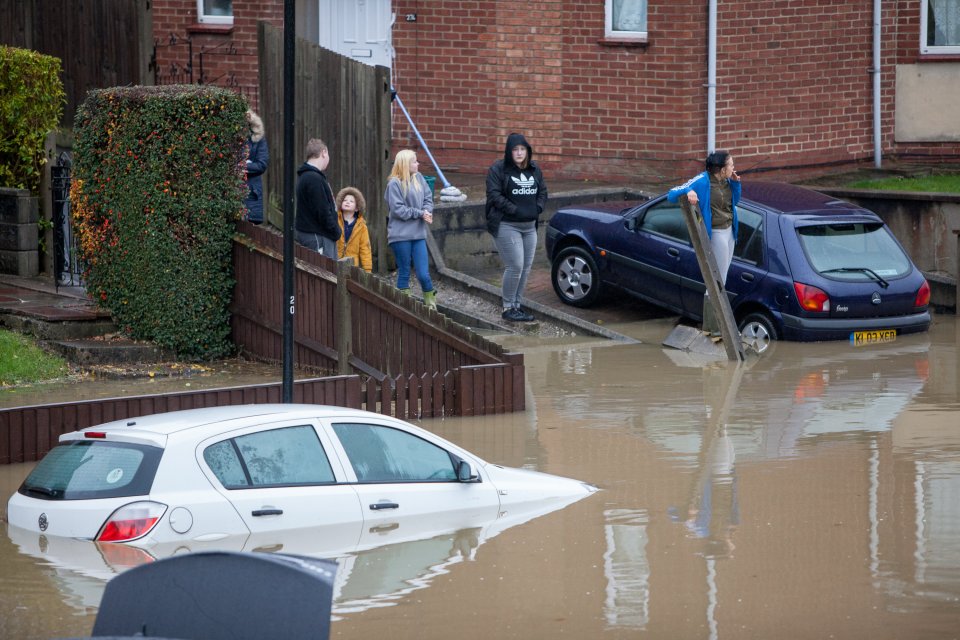  Residents were trapped after their street was suddenly turned into a small lake before 8am this morning