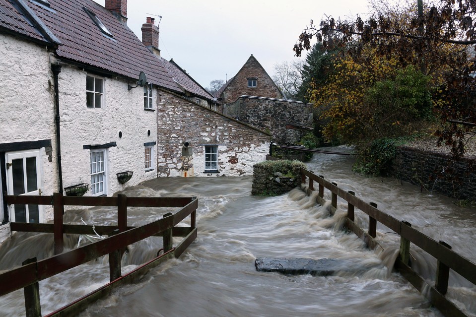  A house was surrounded by flood waters at Croscombe in Somerset following torrential rain brought in by Storm Angus