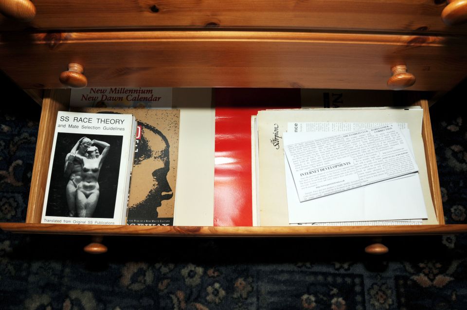  They were also shown a series of pictures of Mair's large collection of far-right books and magazines