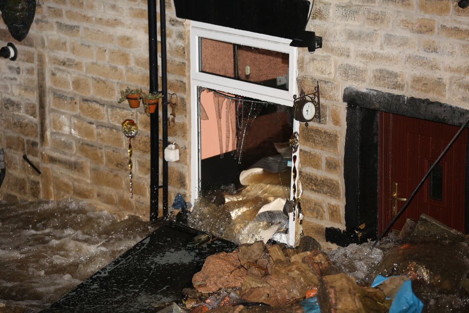  The water raced through houses and out through doors and windows