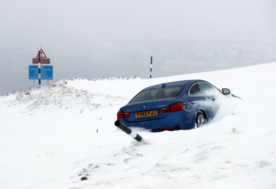  A car stuck in the snow on the A686 on the Northumberland and Cumbria border today