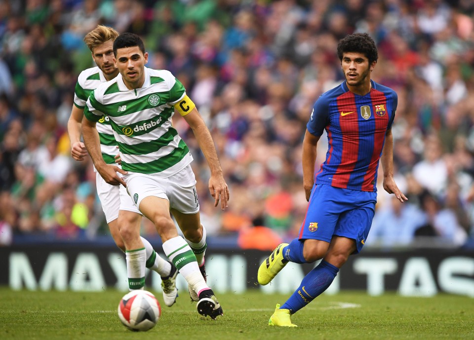 Carles Alena of Barcelona and Tomas Rogic