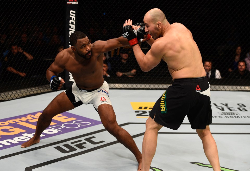  Evans punches Glover Teixeira in their light heavyweight bout in April