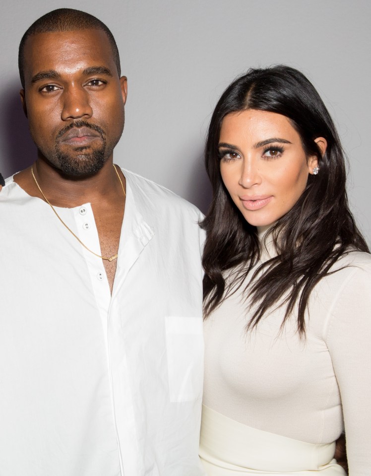  Kanye rushes to be by wife Kim's side after she is held at gun point in Paris