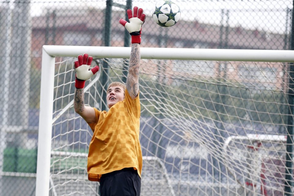  Bieber tries his hand in goal at the Barca training session